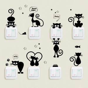 Detail view of cartoon black cat silhouette PVC wall stickers applied to light switches