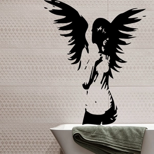 Artistic black silhouette wall decal of a winged girl on bathroom tiles with bathtub