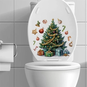 Detailed watercolor Christmas tree and gift box decals applied on a white toilet lid