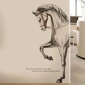 Detail view of horse sketch wall sticker with inspirational quote on beige wall decor