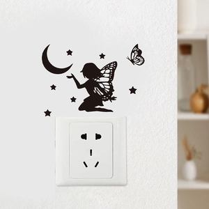 Fairy and crescent moon black PVC wall sticker silhouette above a white light switch