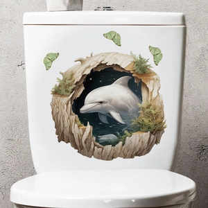 Detail view of 3D dolphin jumping out of a rock cave wall decal on a white toilet