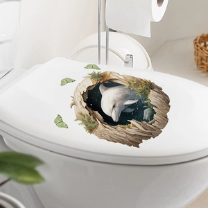 Detailed view of 3D dolphin toilet lid sticker with green moss and butterfly decals