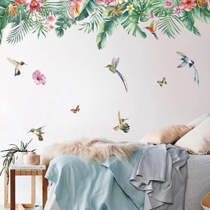 Tropical wall stickers with colorful hummingbirds and green botanical leaves for bedroom decor