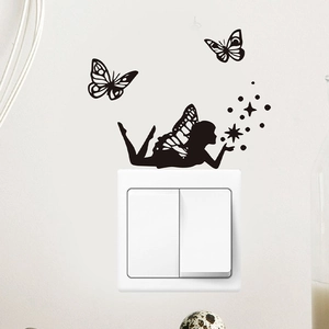 Detail of black fairy and butterfly silhouette wall sticker for home switch decor