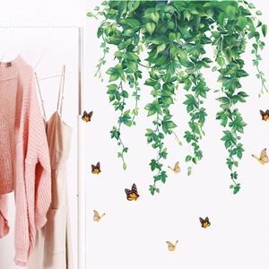 Self-adhesive wall sticker featuring hanging green plant vines and orange butterflies