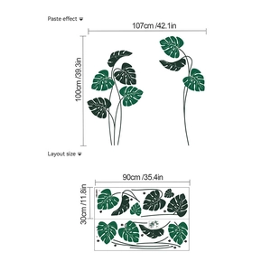 Detail showing green monstera leaf wall sticker paste effect and layout dimensions
