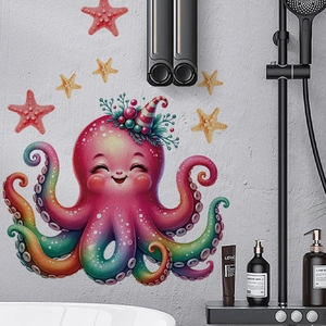 Détail de décalcomanies de poulpe et d'étoiles de mer en PVC sur un mur gris de salle de bain