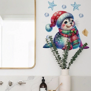 Détail d'un autocollant de phoque de Noël avec étoiles sur le mur d'une salle de bain