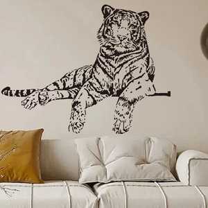 Detailed view of a black realistic tiger wall sticker in a living room interior setup