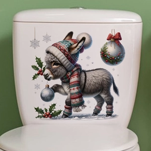 Detailed view of cute Christmas donkey wall decal applied on white toilet tank