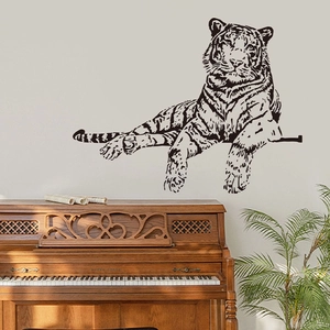 Realistic black tiger silhouette wall sticker applied on wall above a classic piano