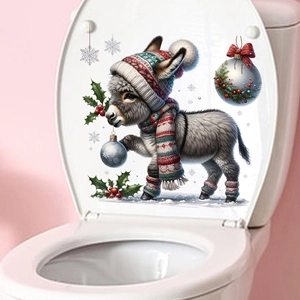 Close-up of cute cartoon donkey Christmas toilet sticker on a white bathroom lid