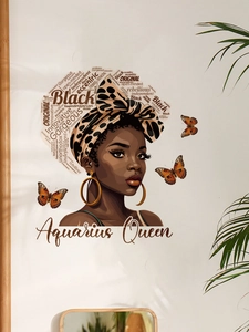 Detail of Aquarius Queen wall sticker featuring African woman and orange butterflies