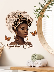Detail of African Queen wall decal featuring leopard headband and golden earrings art