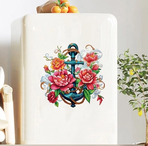 Detailed view of nautical anchor wall sticker with floral design on a white fridge door