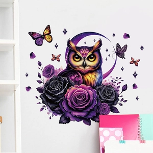 Detail of vibrant owl wall sticker with purple roses and butterflies on a white wall