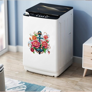 Detail of red peony and blue anchor sticker applied on a white washing machine surface