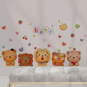 Detail view of cartoon bear wall stickers with cute hearts and stars for nursery decor