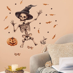 Halloween dancing skeleton wall sticker set with pumpkins and leaves on beige wall