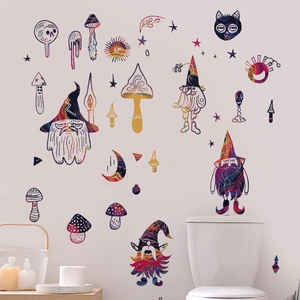 Detail view of whimsical mushroom and elf wall stickers in a modern bathroom decor setting