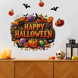 Close-up of Happy Halloween wall decal set with pumpkins and bats on a white wall