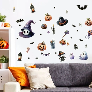 Halloween wall stickers featuring pumpkin, ghost and bat motifs in a cozy living room decor