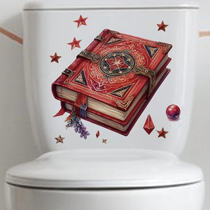 Detail of magic book wall sticker with gold stars on a white surface for Halloween decor