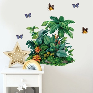 Macro detail of tropical plant wall decals featuring palm trees, monstera and butterflies
