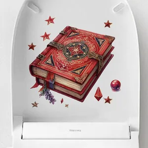 Detail showing 3D magical red book and star stickers on a white toilet cover surface