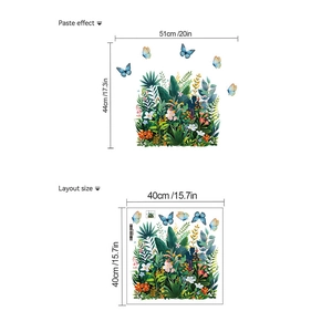 Detail of tropical plant wall stickers set with green leaves and blue butterflies