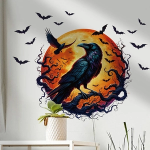 Detail view of Halloween crow and red moon wall sticker on a minimalist white living room wall