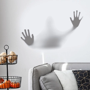 Halloween 3D ghost wall sticker showing a white spirit reaching out from the home wall