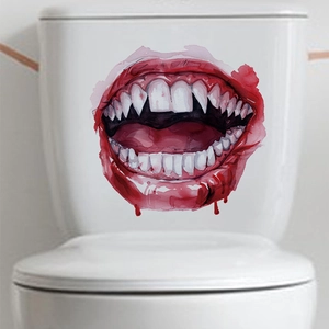 Macro detail of Halloween horror open mouth toilet sticker with sharp fangs and blood