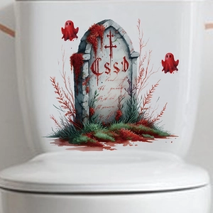 Detail of Halloween tombstone and red ghost PVC sticker applied on a white toilet tank