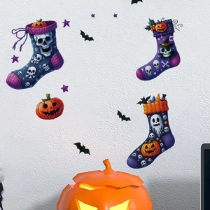 Detail of Halloween stocking wall stickers with skull and pumpkin patterns on white wall