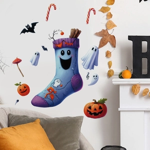 Cute Halloween wall stickers with ghost socks and pumpkins on a white wall in a cozy room