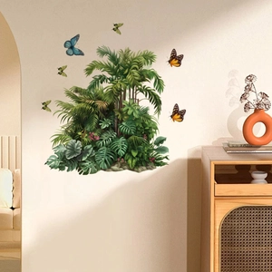 Close-up of tropical palm and monstera leaf wall stickers with colorful 3D butterflies