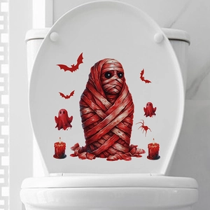 Detailed toilet lid decal featuring a red mummy, bats, and ghosts for Halloween decor