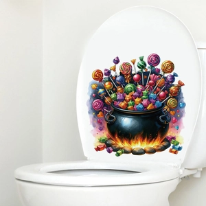 Detail of Halloween cauldron sticker with colorful candy on a white toilet lid