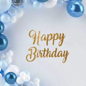 Light blue and white balloon arch set with golden Happy Birthday wall lettering decor