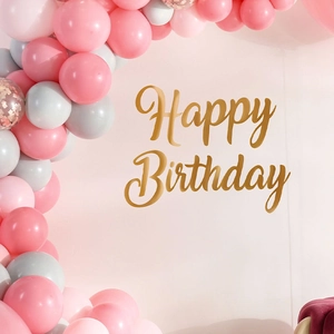 Pink and grey macaque balloon arch kit with gold Happy Birthday wall stickers