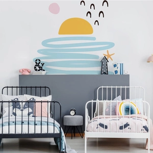 Detail of cartoon sun and wave wall stickers in a minimalist Nordic style bedroom