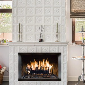 Detail of modern black electric fireplace with realistic burning wood and warm flames
