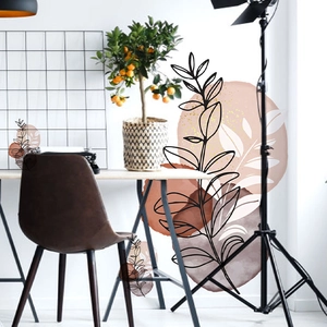 Abstract geometric and botanical leaf wall stickers for a modern living room decor