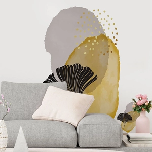 Detail view of abstract geometric wall sticker with ginkgo leaves and gold polka dots decor