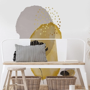 Detail of self-adhesive wall stickers with abstract gray and ginger yellow leaf patterns