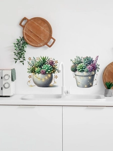 Detail of succulent plant wall stickers in a modern kitchen setting with soft lighting