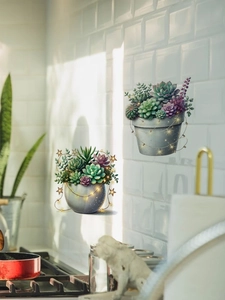 Macro detail of self-adhesive succulent wall stickers with warm LED fairy lights design