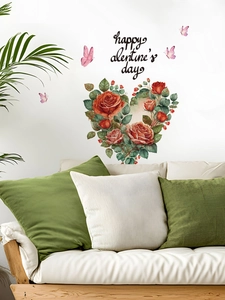 Détail d'un sticker mural cœur de roses rouges avec texte Happy Valentine's Day et papillons